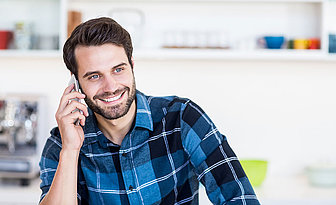 Young employee talking on the phone